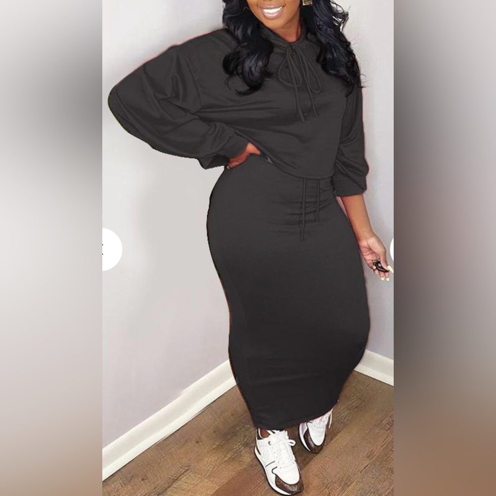 Brand New, never worn Pullover hoodie skirt set. Black. Size Large, US 8-10.